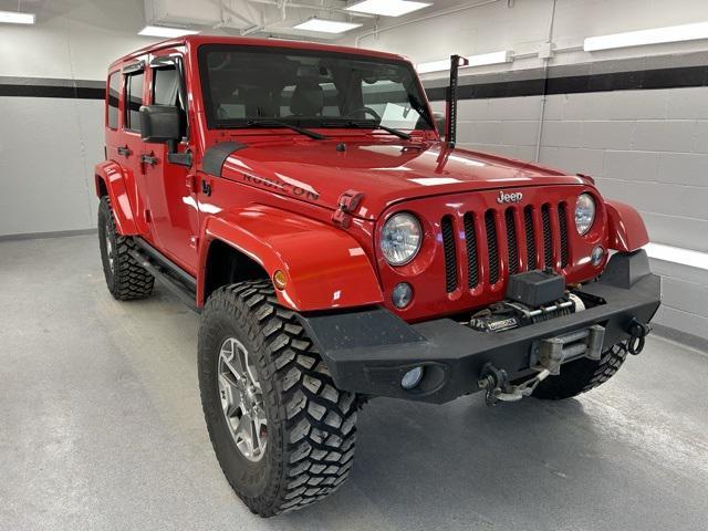 used 2014 Jeep Wrangler Unlimited car, priced at $17,399