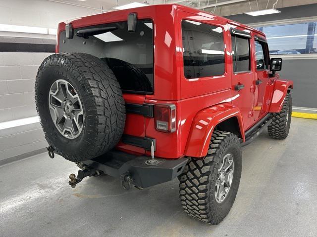 used 2014 Jeep Wrangler Unlimited car, priced at $17,399