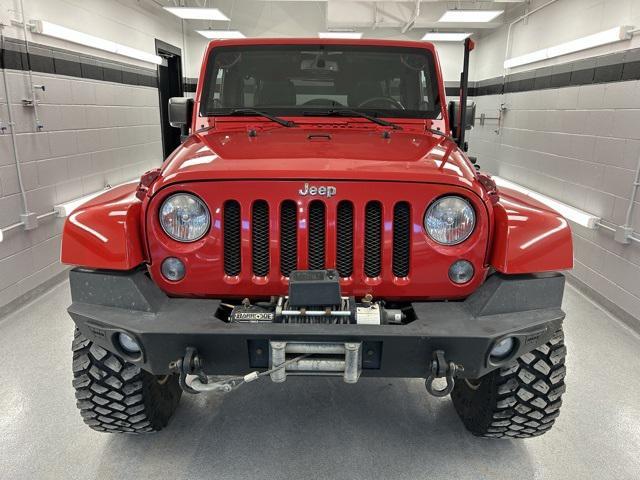 used 2014 Jeep Wrangler Unlimited car, priced at $17,399