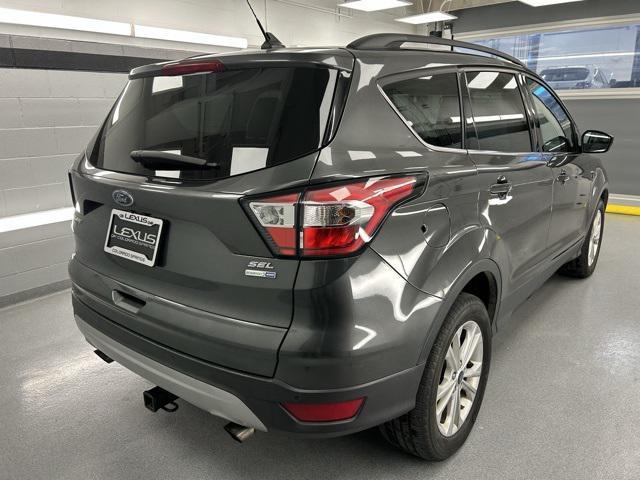 used 2018 Ford Escape car, priced at $12,799