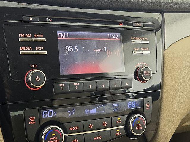 used 2016 Nissan Rogue car, priced at $13,990