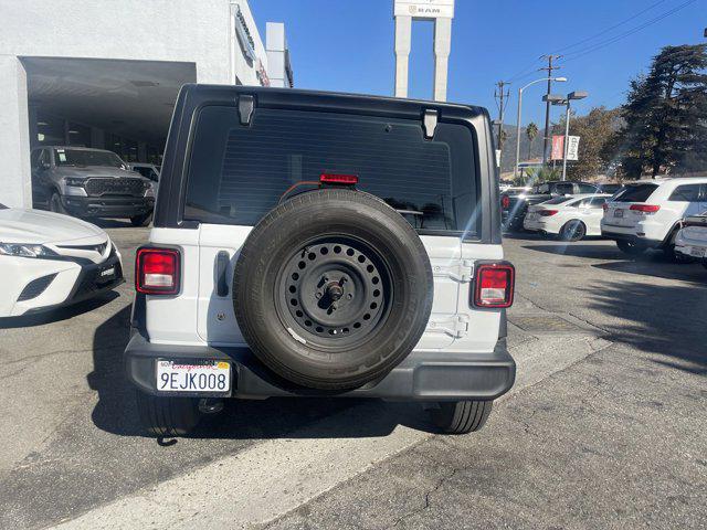 used 2023 Jeep Wrangler car, priced at $33,491