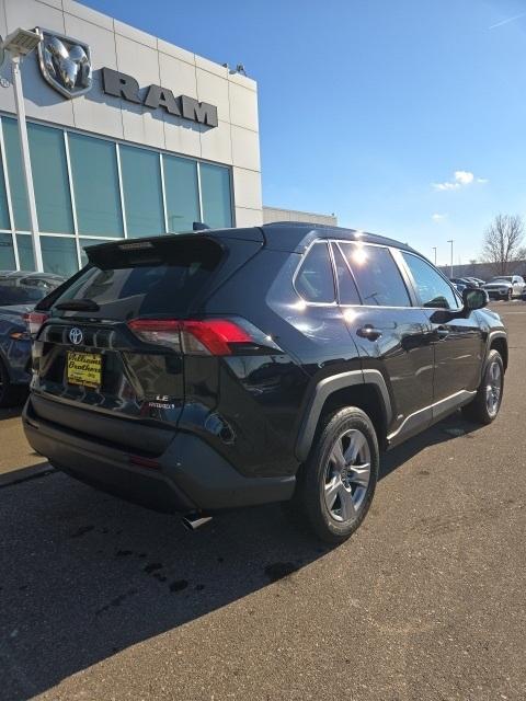 used 2022 Toyota RAV4 Hybrid car, priced at $27,555