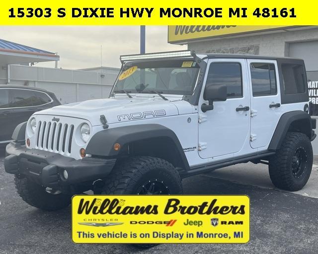 used 2013 Jeep Wrangler Unlimited car, priced at $17,935