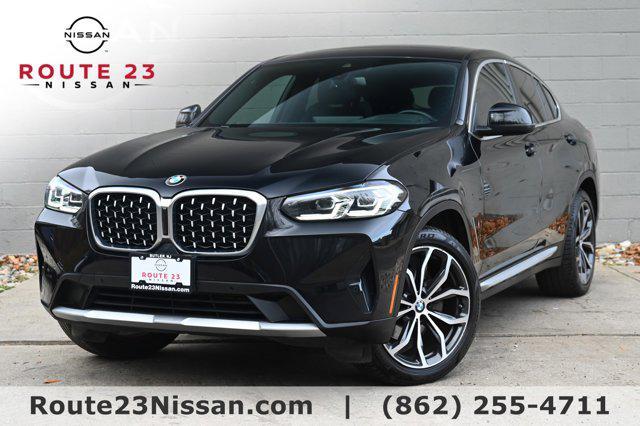 used 2022 BMW X4 car, priced at $34,068