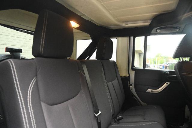 used 2013 Jeep Wrangler Unlimited car, priced at $11,999