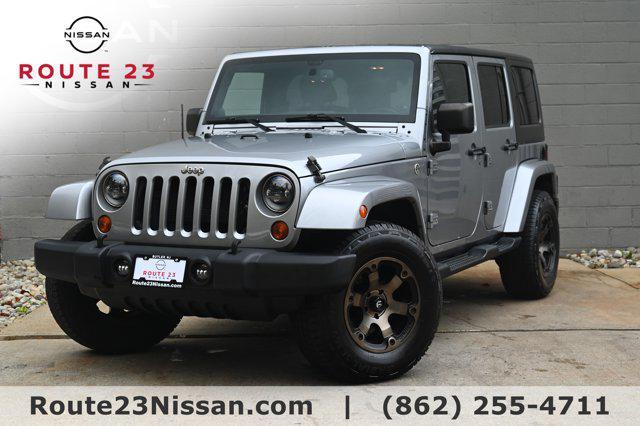 used 2013 Jeep Wrangler Unlimited car, priced at $11,999