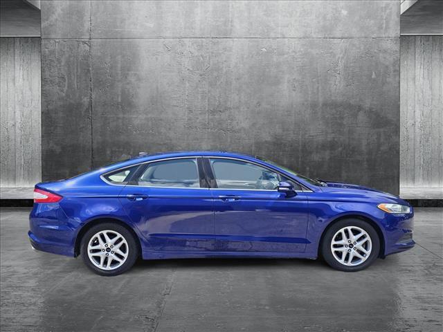 used 2014 Ford Fusion car, priced at $8,594