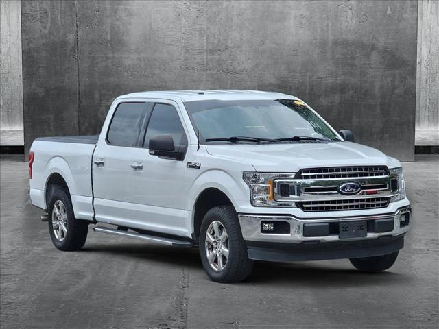 used 2018 Ford F-150 car, priced at $26,194