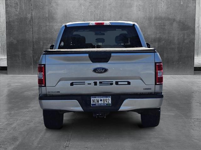 used 2018 Ford F-150 car, priced at $24,594