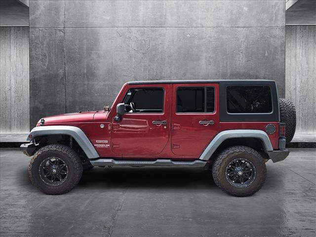 used 2012 Jeep Wrangler Unlimited car, priced at $16,010
