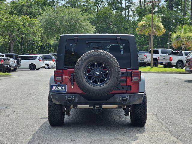 used 2012 Jeep Wrangler Unlimited car, priced at $16,010