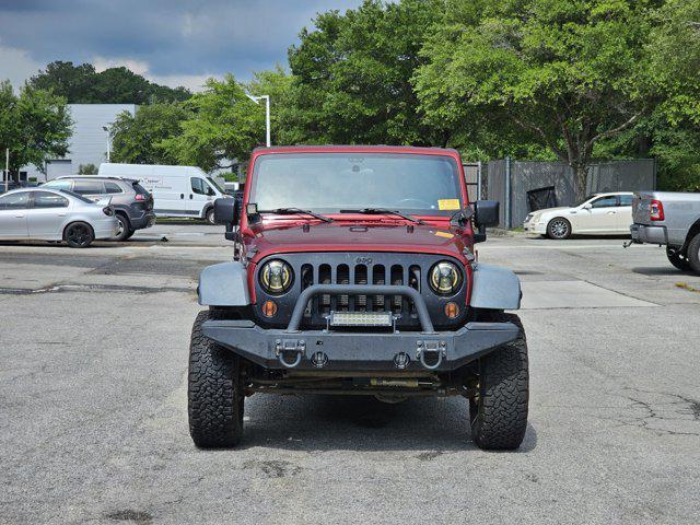 used 2012 Jeep Wrangler Unlimited car, priced at $16,010