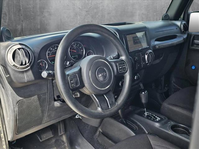 used 2014 Jeep Wrangler Unlimited car, priced at $18,904