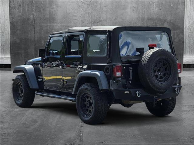 used 2014 Jeep Wrangler Unlimited car, priced at $18,904