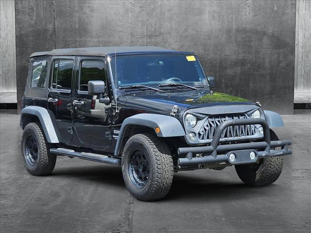 used 2014 Jeep Wrangler Unlimited car, priced at $18,904