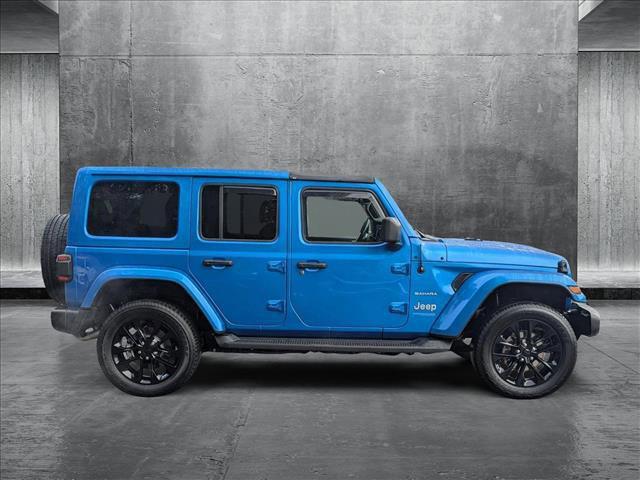 used 2021 Jeep Wrangler Unlimited car, priced at $35,338