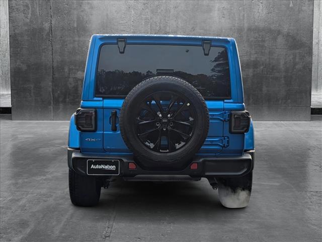 used 2021 Jeep Wrangler Unlimited car, priced at $35,338