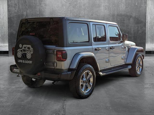 used 2021 Jeep Wrangler Unlimited car, priced at $33,152