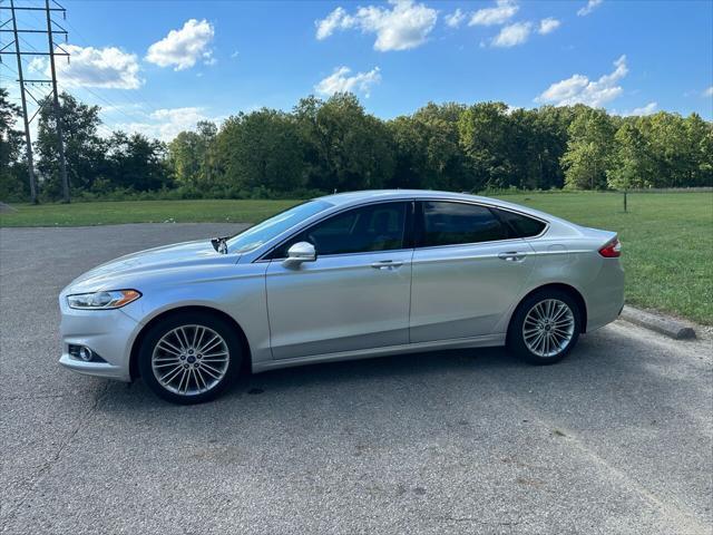 used 2014 Ford Fusion car, priced at $8,599