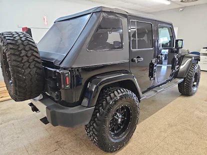 used 2014 Jeep Wrangler Unlimited car, priced at $14,999