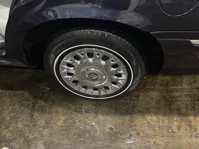 used 2003 Mercury Grand Marquis car, priced at $13,499