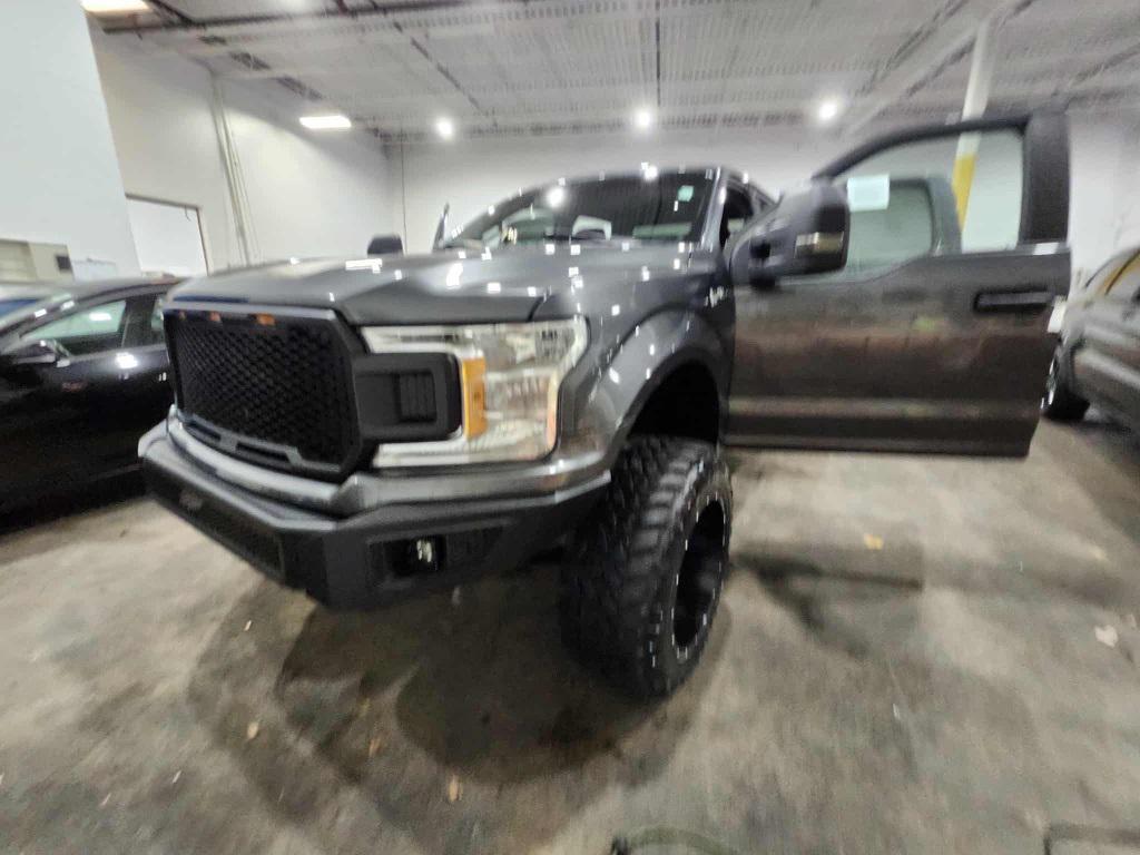 used 2018 Ford F-150 car, priced at $19,999