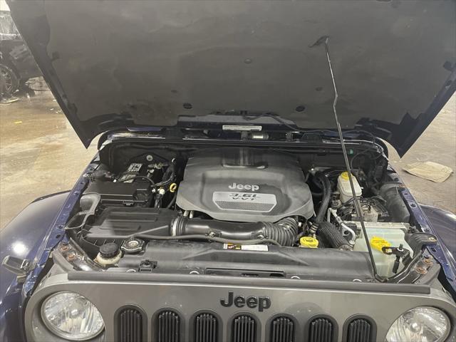 used 2012 Jeep Wrangler Unlimited car, priced at $16,999