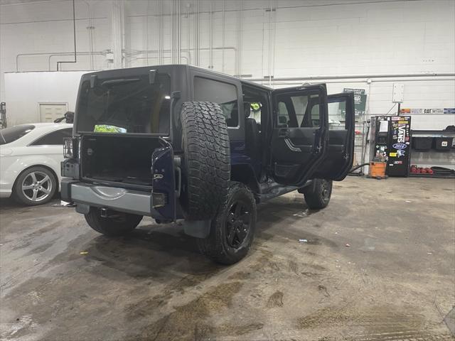 used 2012 Jeep Wrangler Unlimited car, priced at $16,999