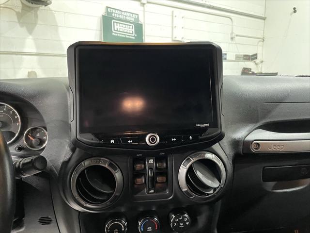 used 2015 Jeep Wrangler Unlimited car, priced at $17,999