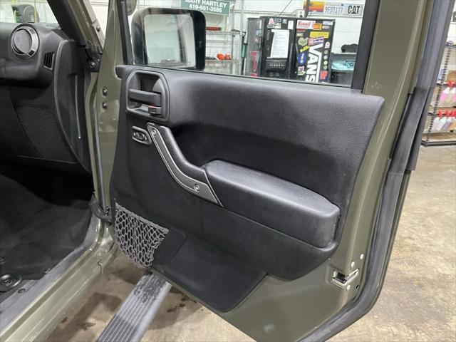 used 2015 Jeep Wrangler Unlimited car, priced at $17,999