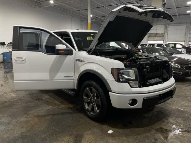 used 2014 Ford F-150 car, priced at $13,999