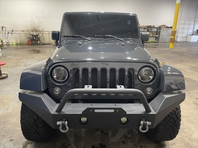 used 2016 Jeep Wrangler Unlimited car, priced at $16,499