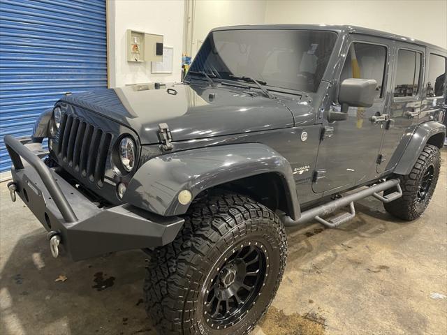 used 2016 Jeep Wrangler Unlimited car, priced at $16,499