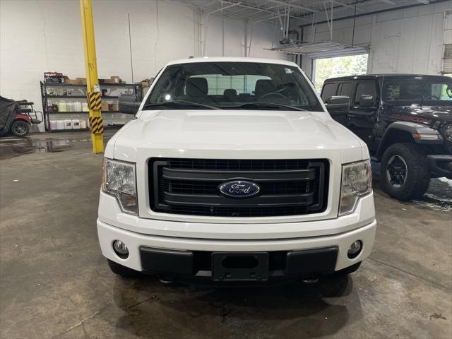 used 2014 Ford F-150 car, priced at $15,999