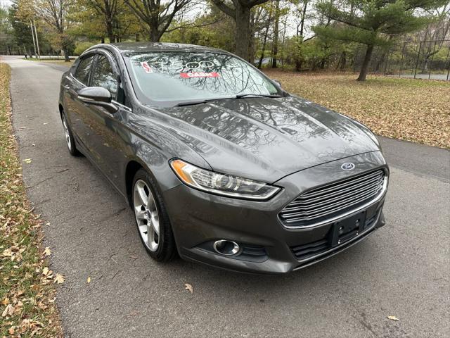 used 2016 Ford Fusion car, priced at $7,000