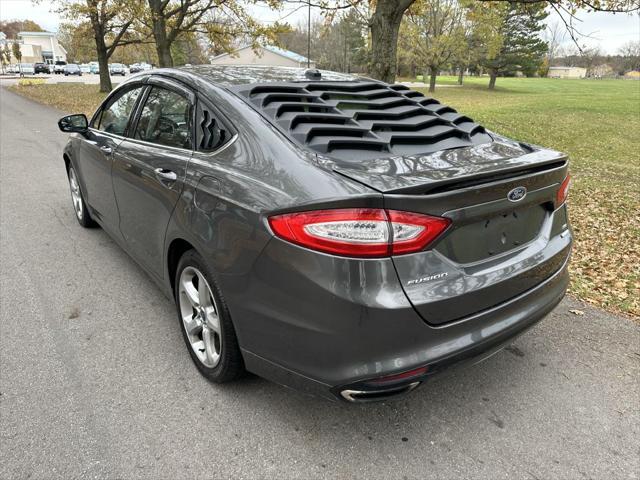 used 2016 Ford Fusion car, priced at $7,000