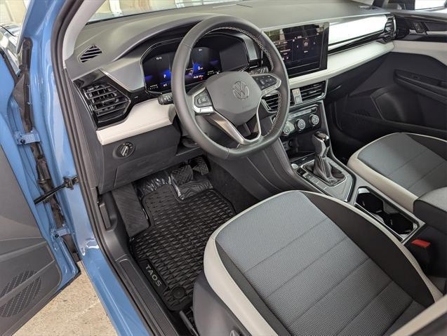 new 2025 Volkswagen Taos car, priced at $27,011
