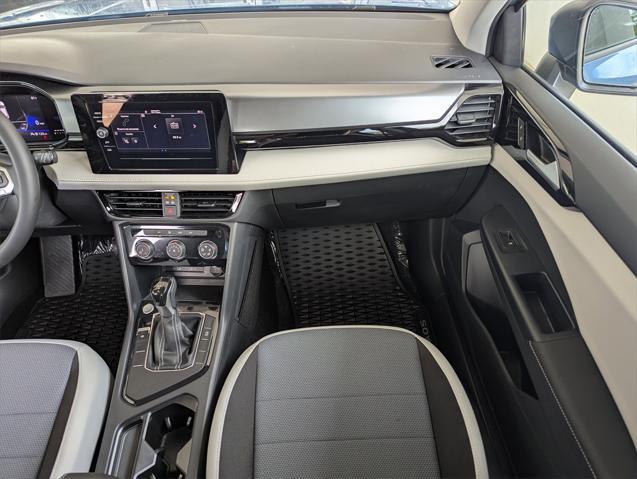 new 2025 Volkswagen Taos car, priced at $27,011