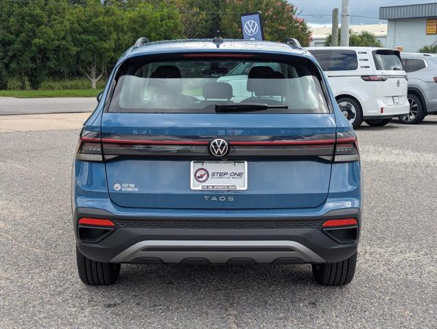 new 2025 Volkswagen Taos car, priced at $27,011