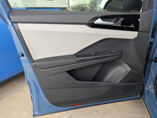 new 2025 Volkswagen Taos car, priced at $27,011
