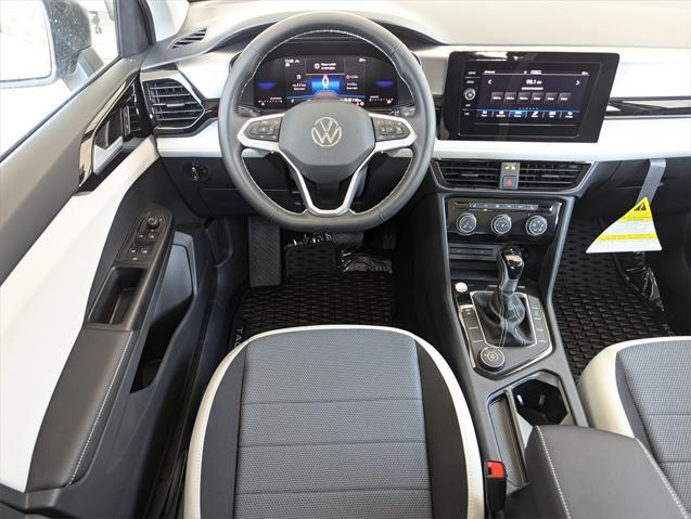 new 2025 Volkswagen Taos car, priced at $30,056