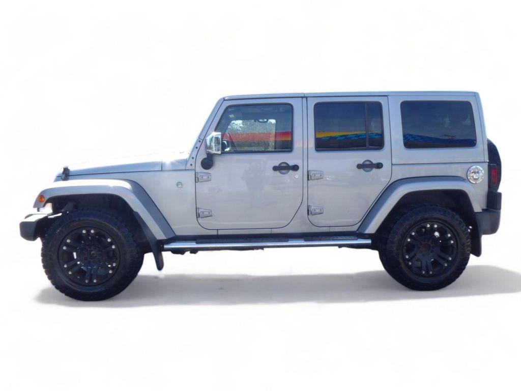 used 2013 Jeep Wrangler Unlimited car, priced at $13,963