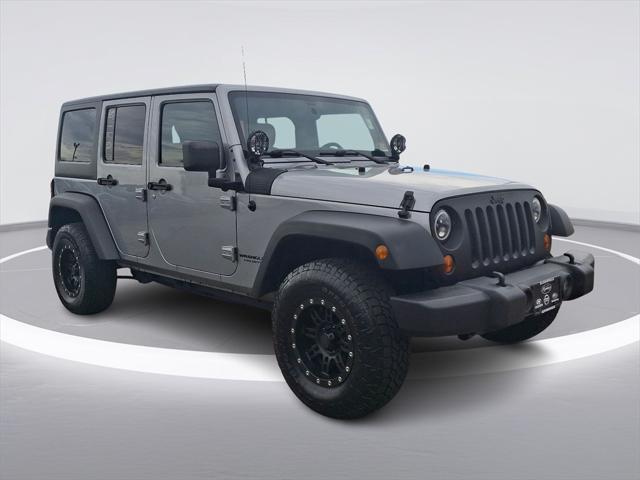 used 2013 Jeep Wrangler Unlimited car, priced at $12,598