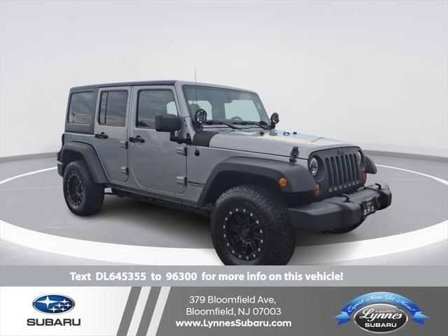 used 2013 Jeep Wrangler Unlimited car, priced at $12,598