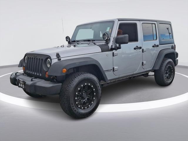 used 2013 Jeep Wrangler Unlimited car, priced at $12,598