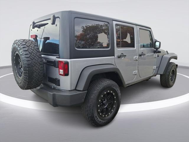 used 2013 Jeep Wrangler Unlimited car, priced at $12,598