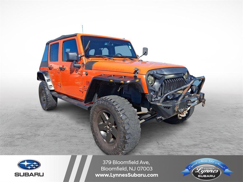 used 2015 Jeep Wrangler Unlimited car, priced at $11,595
