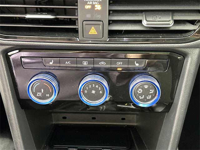used 2023 Volkswagen Taos car, priced at $25,000