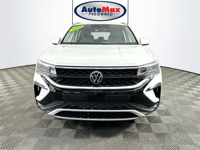 used 2023 Volkswagen Taos car, priced at $25,000
